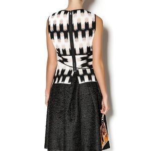 BCBGMAXAZARIA - EMBROIDERED JOLYNE PEPLUM TOP - XS